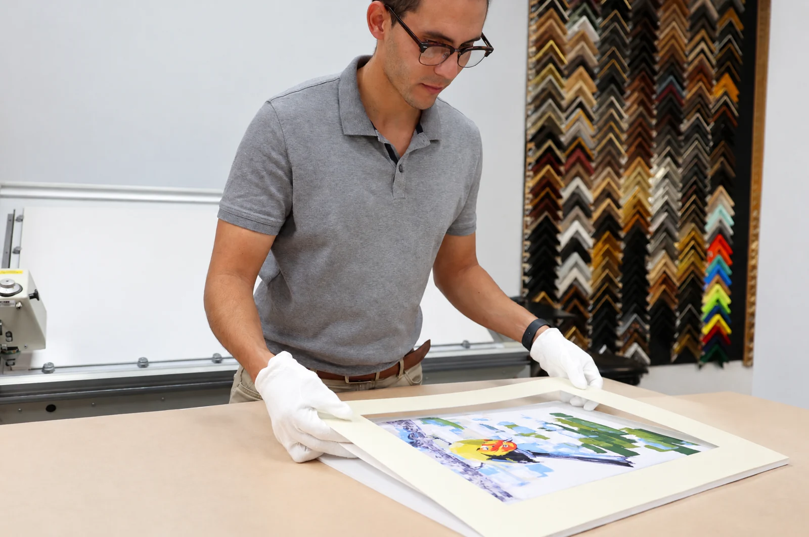 Conservation framing process with archival matting and handcrafted frame materials