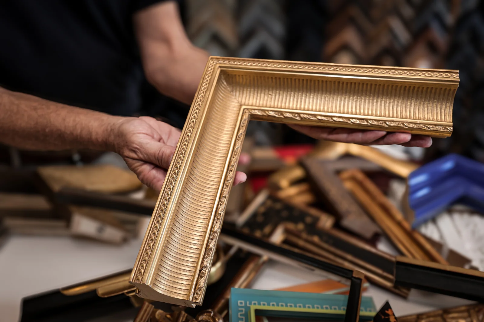 Luxury gold frame mouldings and premium framing materials at Masten Fine Framing