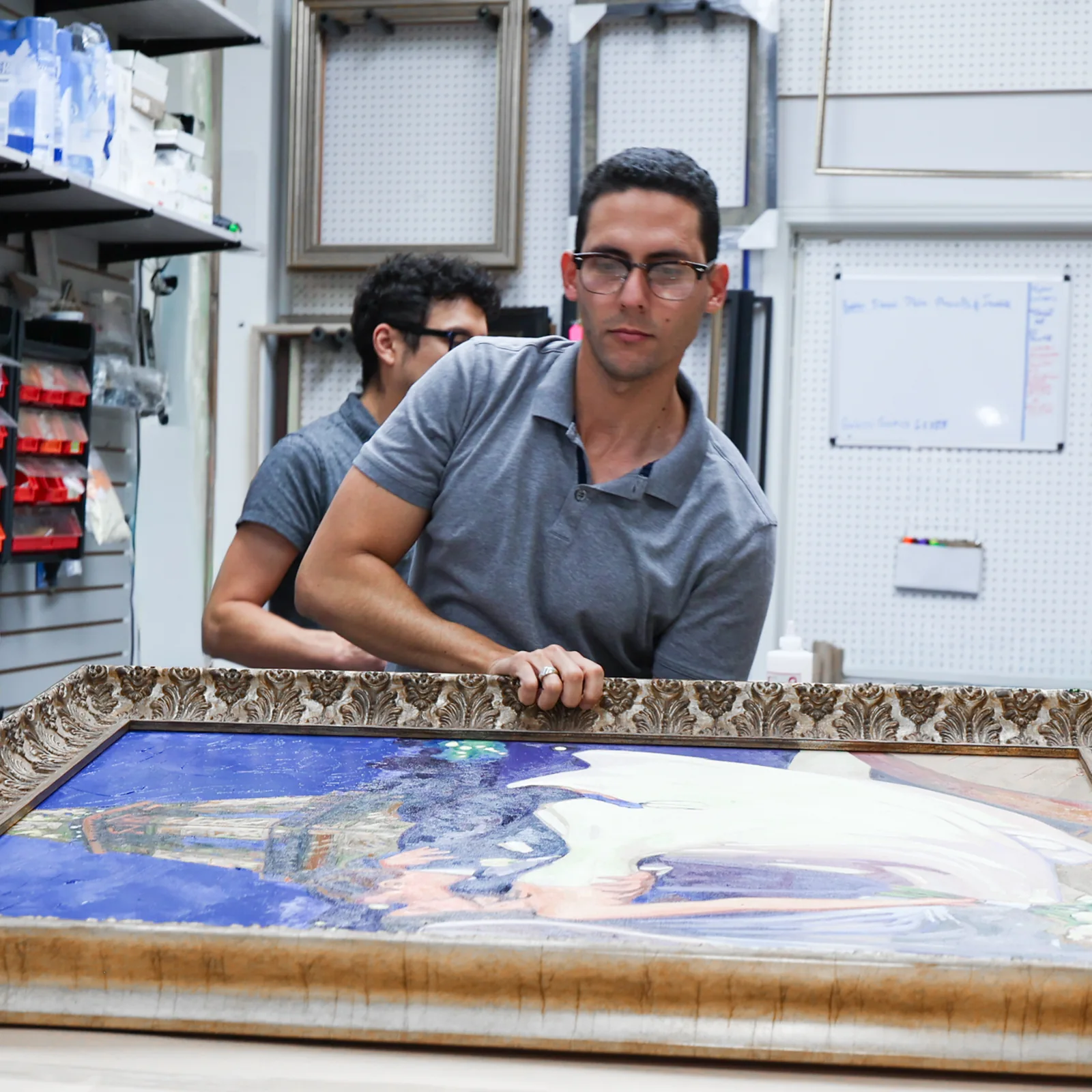 Masten framing studio with curated moulding samples and design materials
